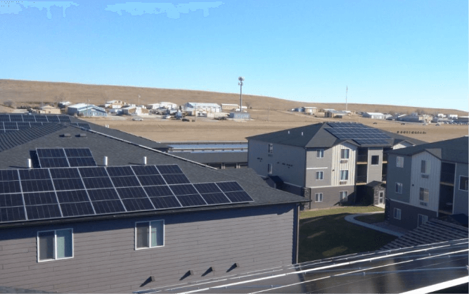 Aerial view of Champion Villas with solar panels