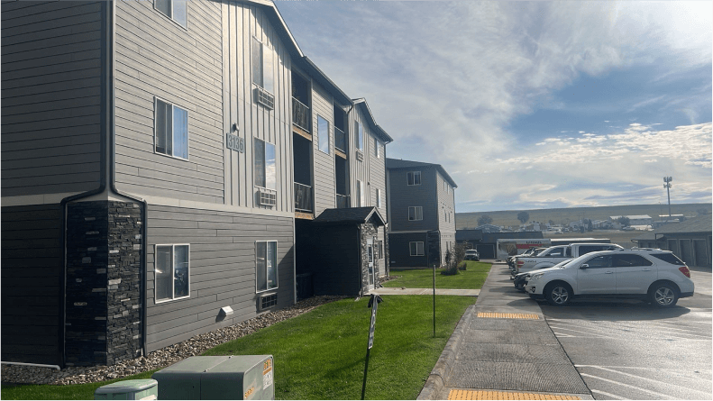 Ground view of Champion Villas apartment buildings