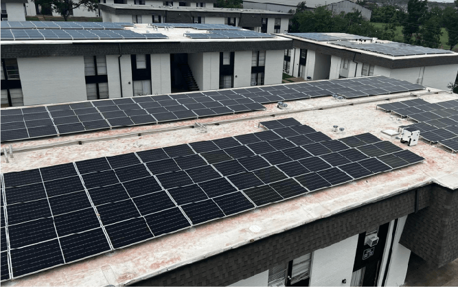 Aerial view of Champion Villas with solar panels
