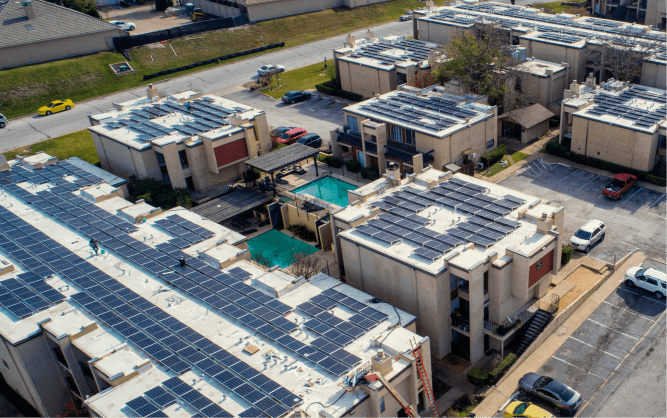 Aerial view of Champion Villas with solar panels